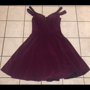 XScape Dress. Dark maroon/purple tint.